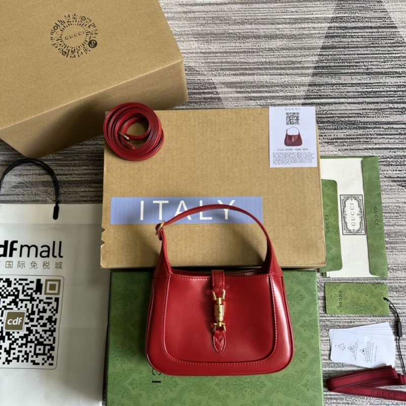 G*u*i top handle bags
